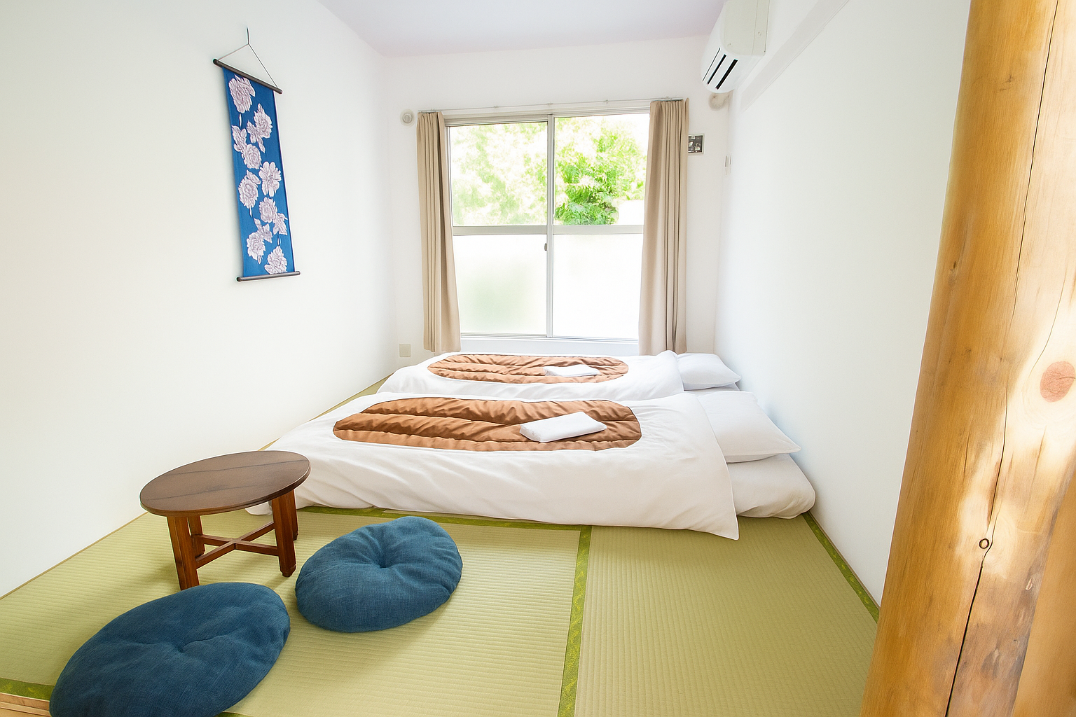 "Japanese Style Twin Room with tatami flooring and futons at Sakura Hotel Nippori in Tokyo"